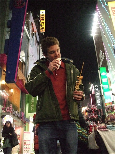 Leif Harum eating bizarre delicacies in Korea
