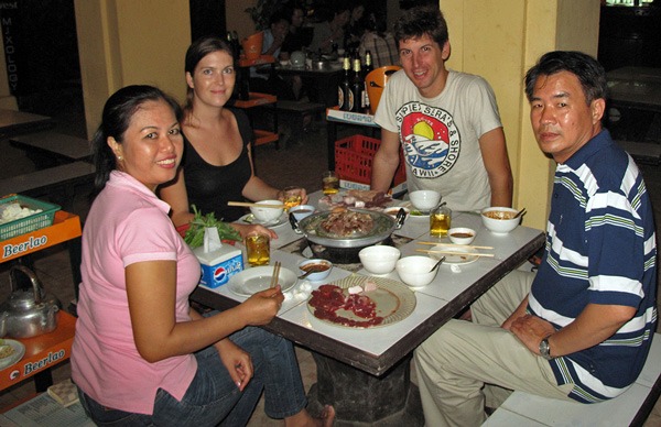 Dinner-with-the-owners-of-our-guesthouse,-Boon-Ping-and-Pathoumphone, with Claire and Iain of Old World Wandering