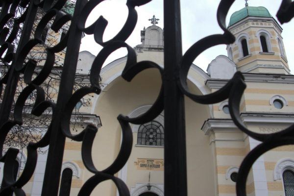 Church in Serbia with wrought iron gate in front; photo by Hardie Karges