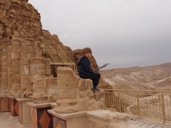little boy looking bored in Israel