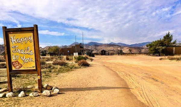 "Happy Trails to You" sign in the American desert, California, USA, 2018