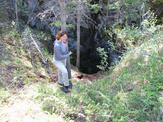 At the entrance to Disaster Point cave in Alberta Canada