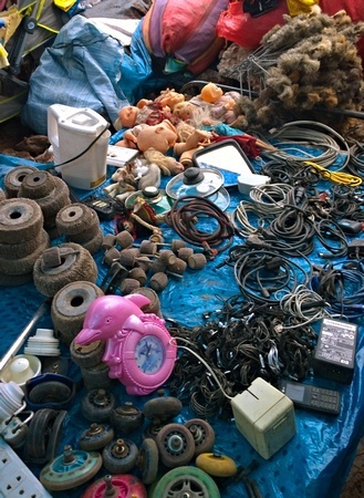 Barratio market offerings, including doll heads and rollerblade wheels