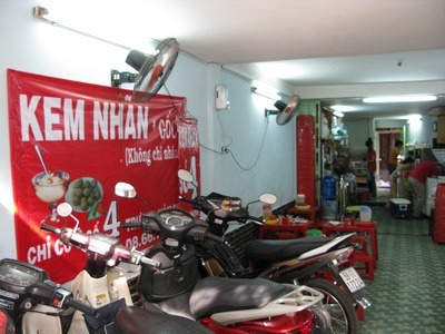 bike parking in Saigon - an ice cream shop / bike parking lot