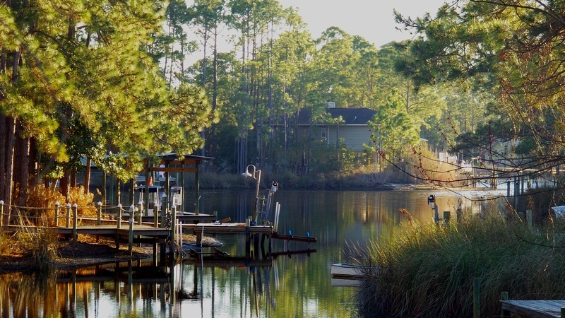 Santa Rosa lagoon with dock and colourful trees