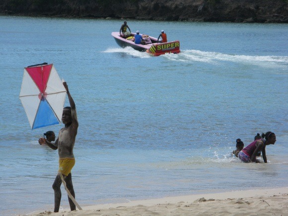 flying kites on the beach