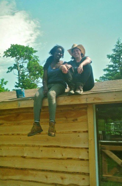 Ndrika on the roof with a friend
