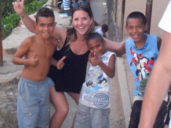 Bella in South America, hanging with the kids in Rocinha